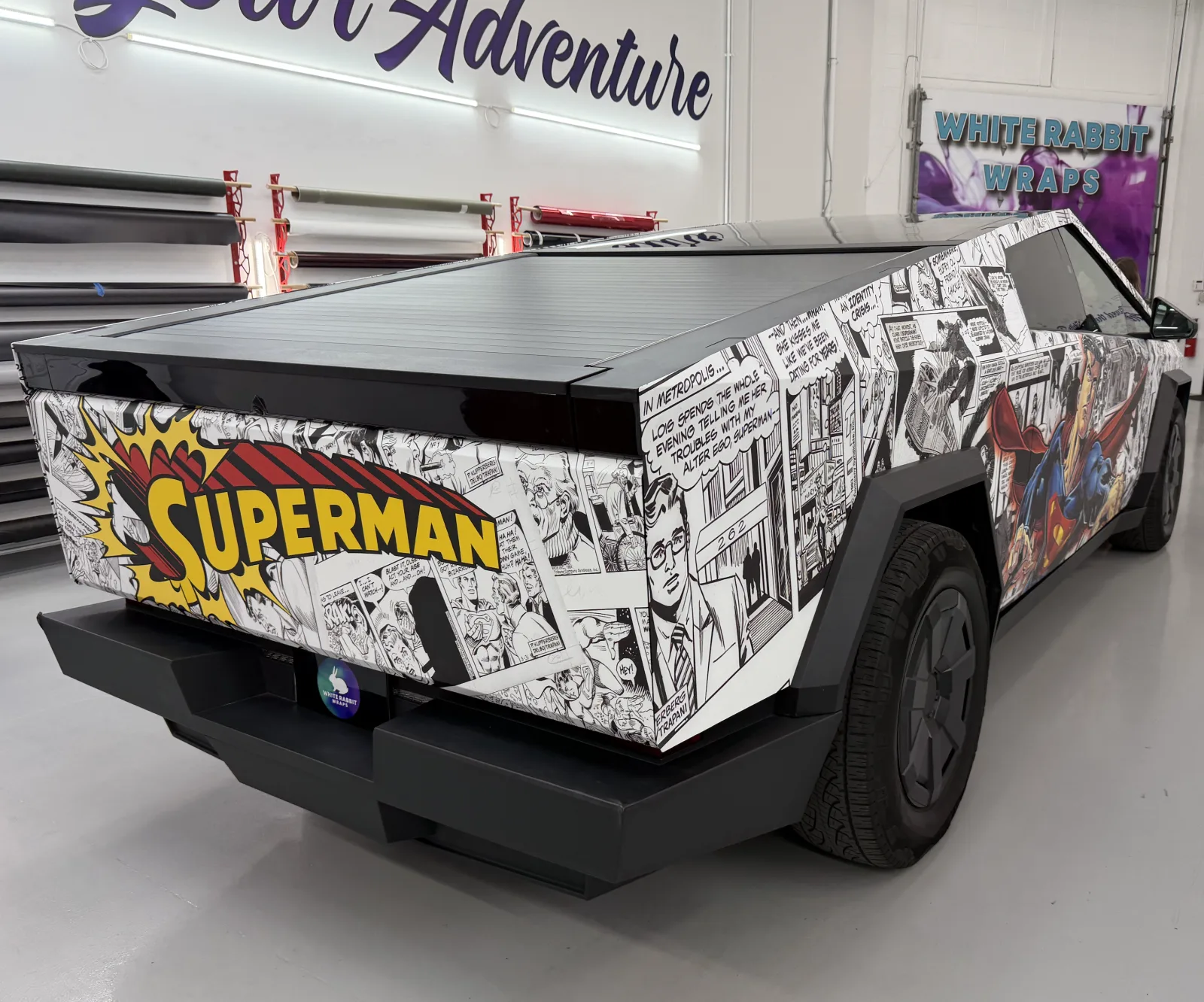 The Superman Cybertruck wrapped in comic panels, parked at White Rabbit Wraps